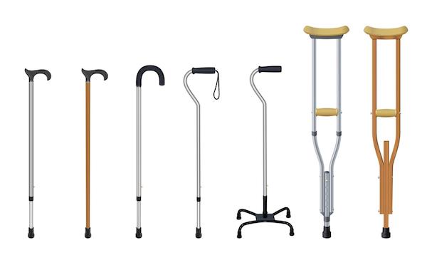 an image of various crutches and canes with a white background